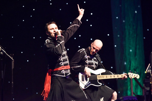 Two people performing as part of the Banquet and Band Christmas Party Package at Royal Armouries