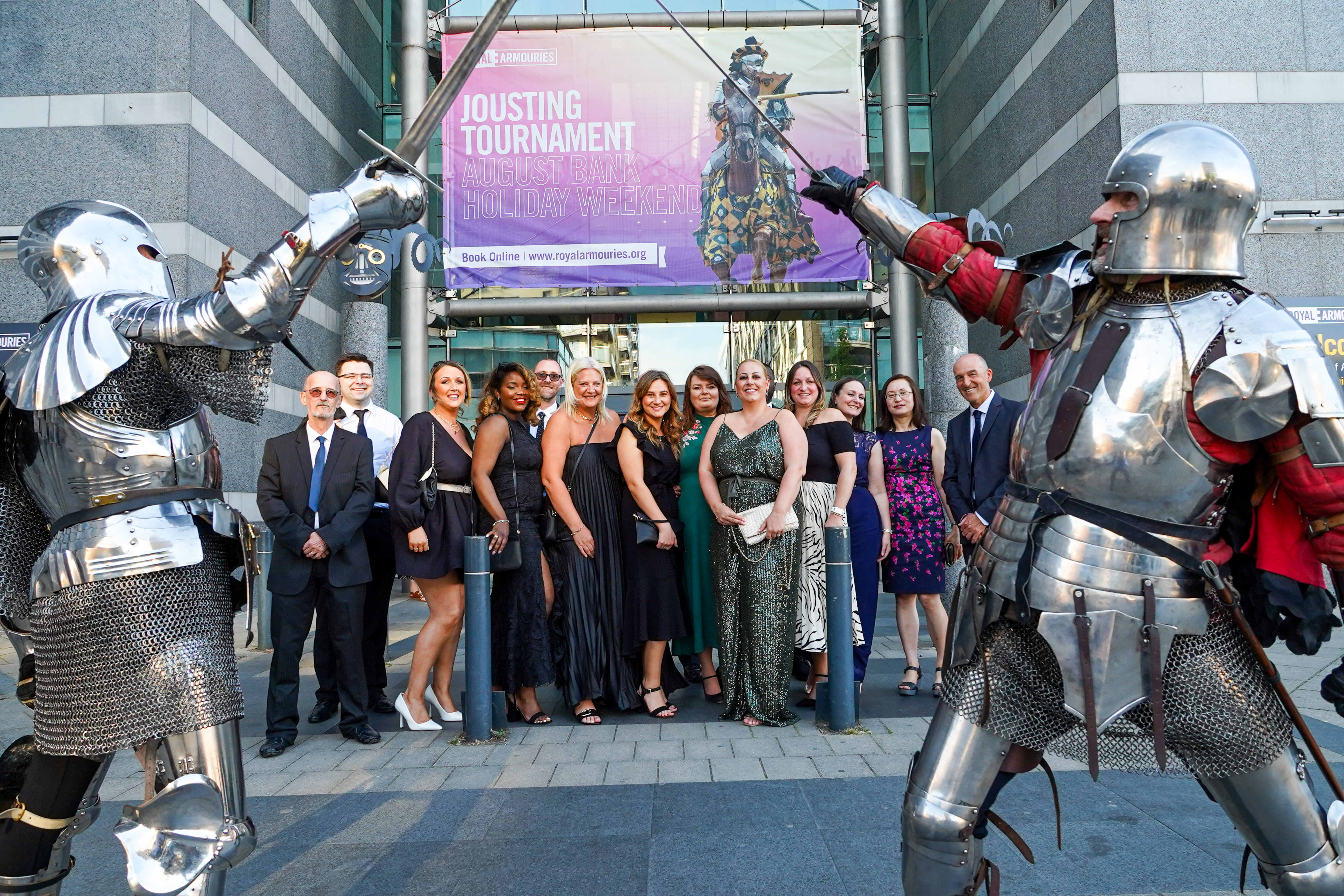A group of people standing infront of Royal Armouries for the Knights at the Museum experience